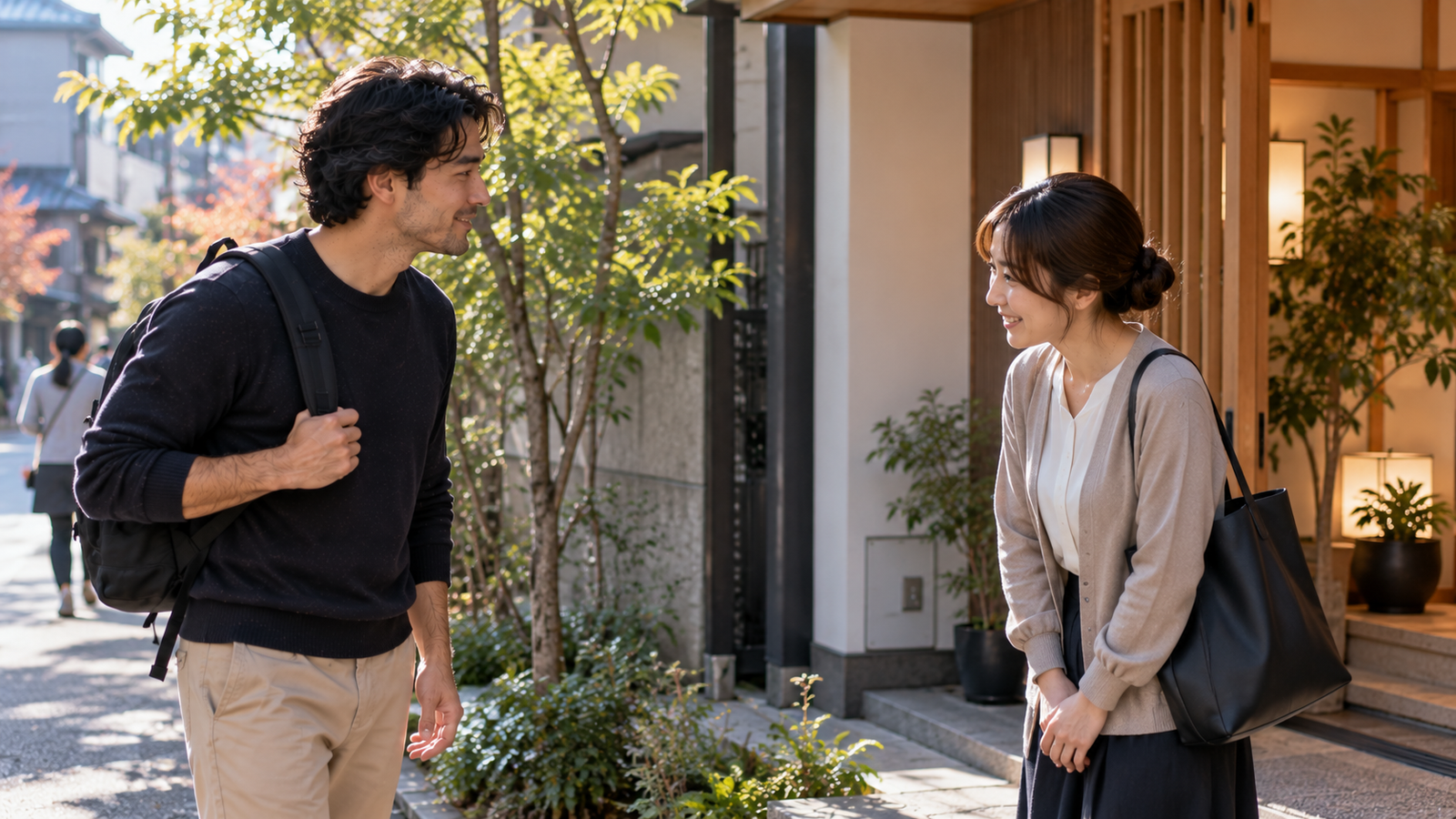 Two adults greeting in an everyday Japanese setting